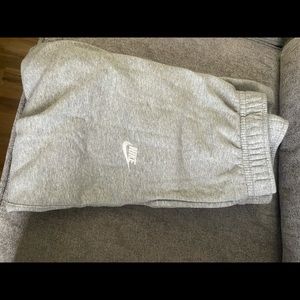 6 pairs of Nike sweat pants